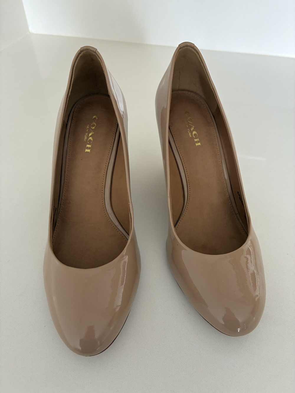 Coach Nude Patent Leather Round-Toe Pumps